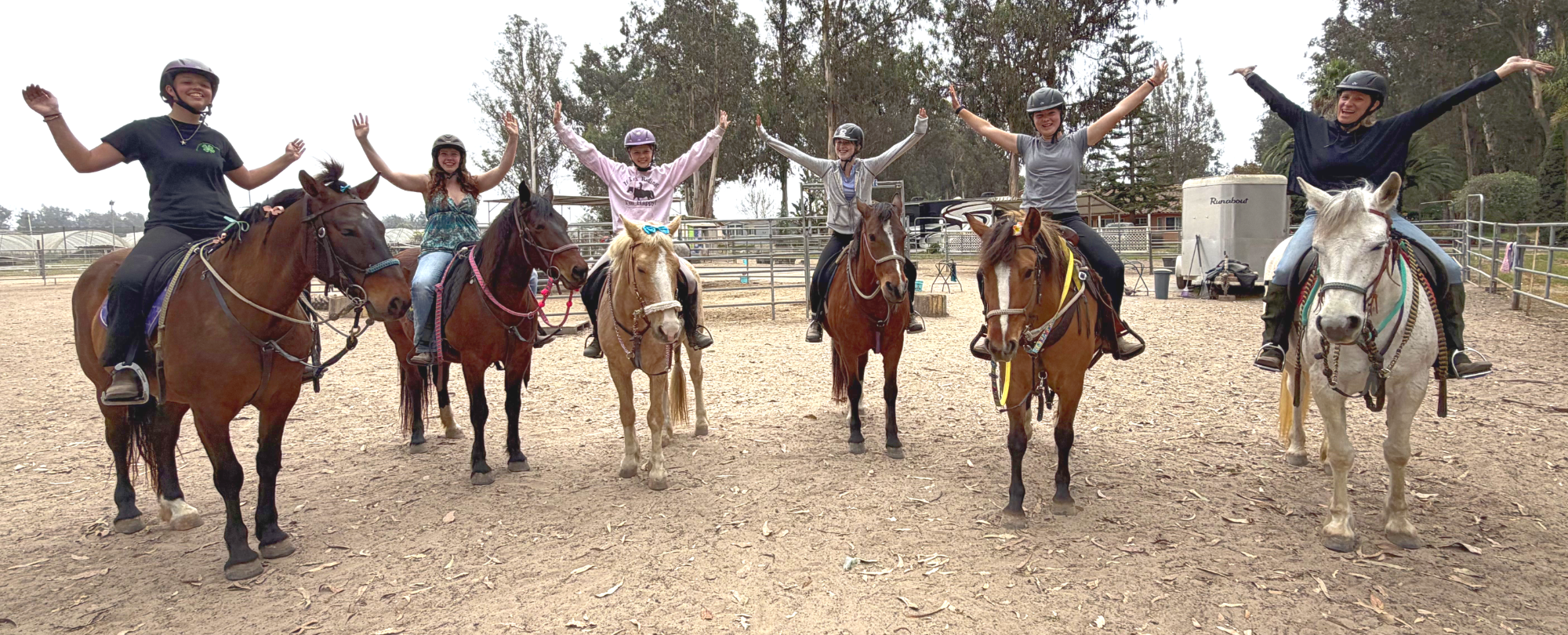 Group of United Mustangs of America riders celebrating together